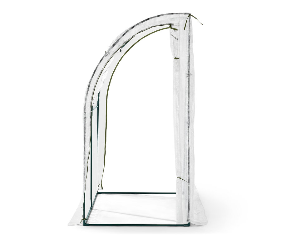 Serre de protection à adosser vide avec porte ouverte.