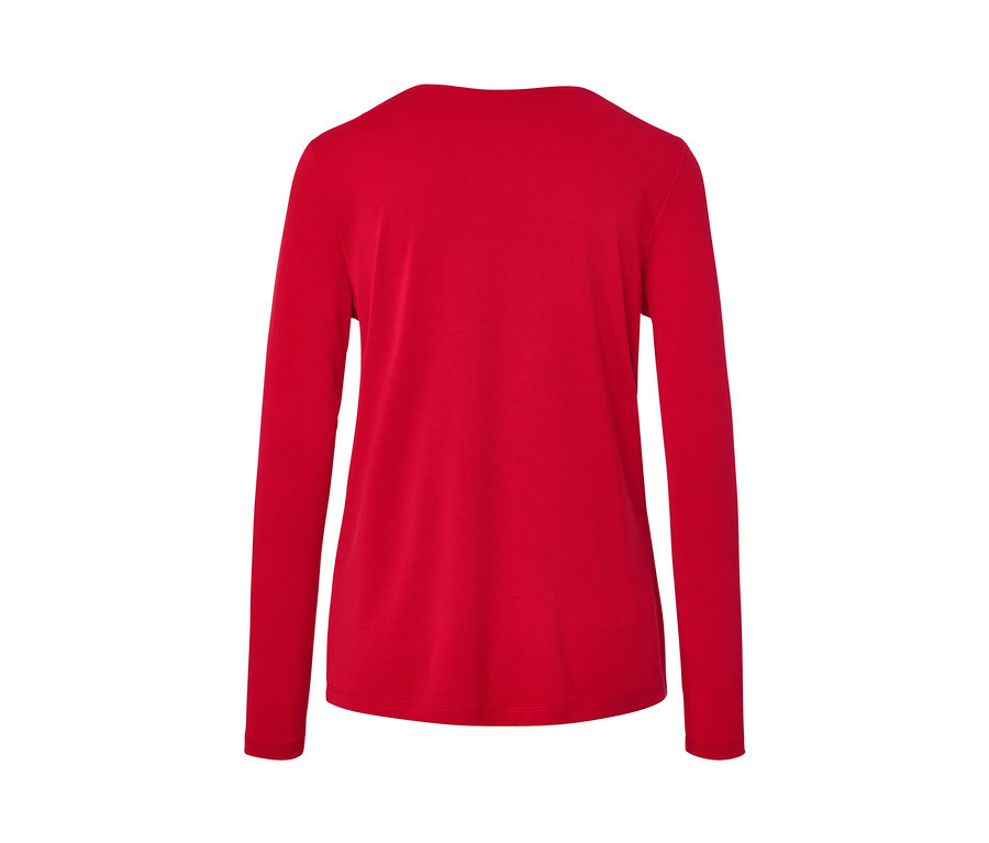 Vue arrière d'une blouse rouge avec fronces.