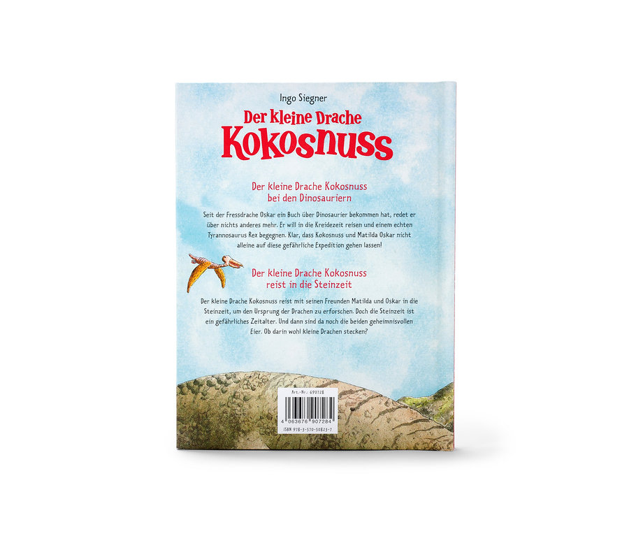 Le livre « Der kleine Drache Kokosnuss – Bei den Dinosauriern & In der Steinzeit » (Le petit dragon Noix de coco – Chez les dinosaures et à l’âge de pierre, en allemand) est posé.