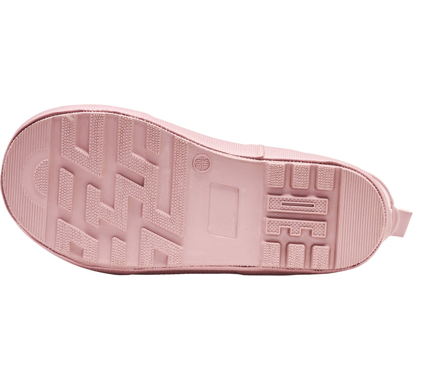Semelle d'une botte en caoutchouc rose.