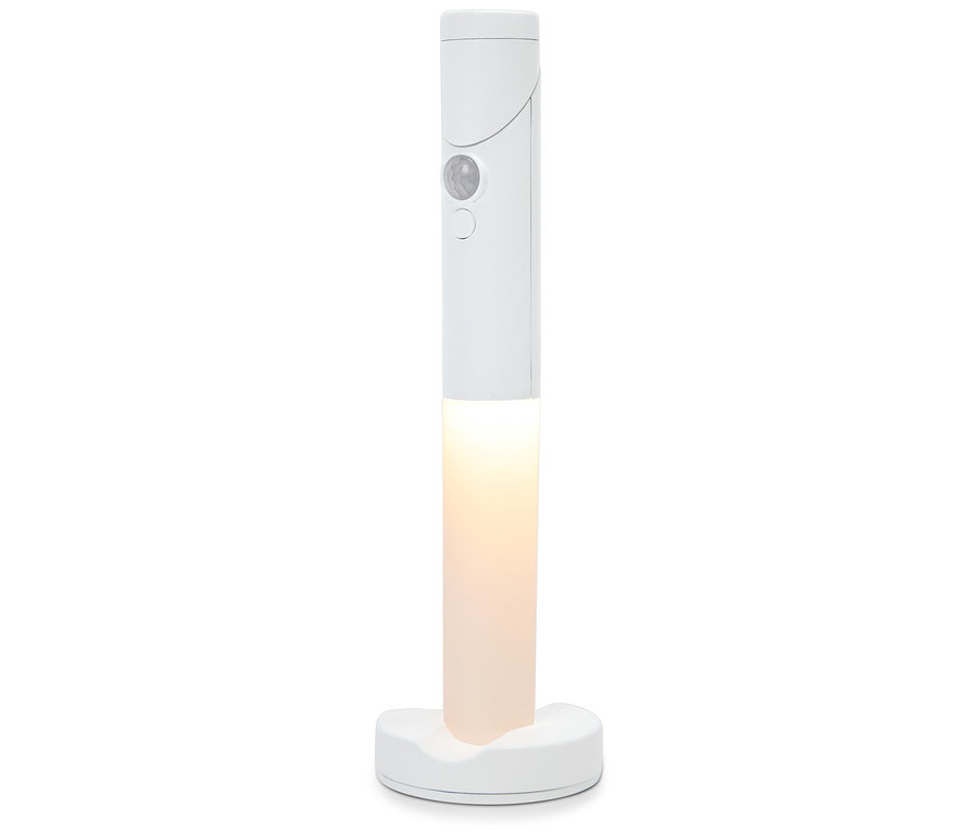 Une lampe LED blanche sur un socle.