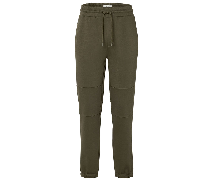 Pantalon de jogging vert avec cordon de serrage à la taille.