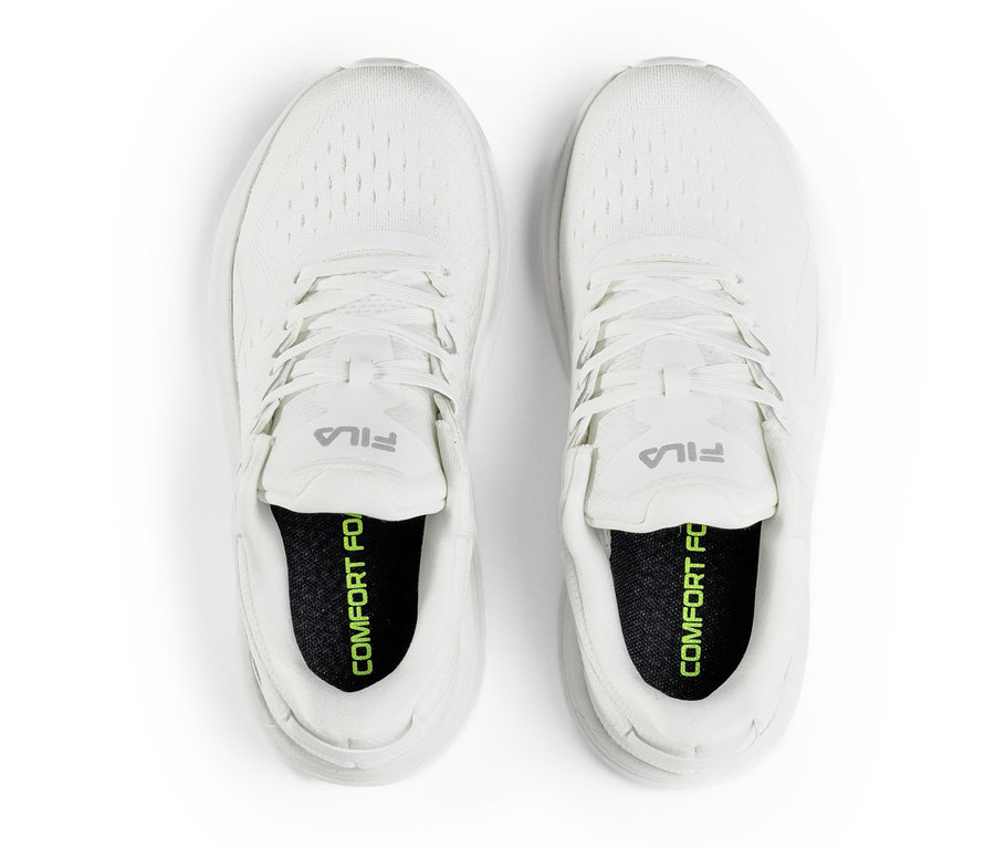 Vue de dessus d'une paire de baskets blanches pour femmes FILA Retron.