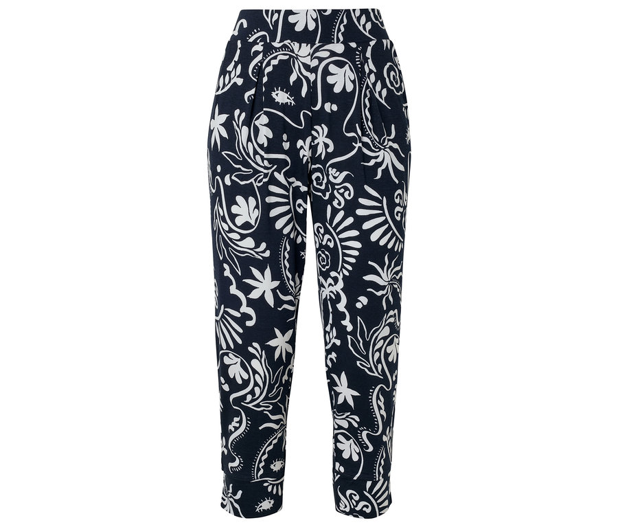 Un pantalon bleu marine avec un motif floral blanc.