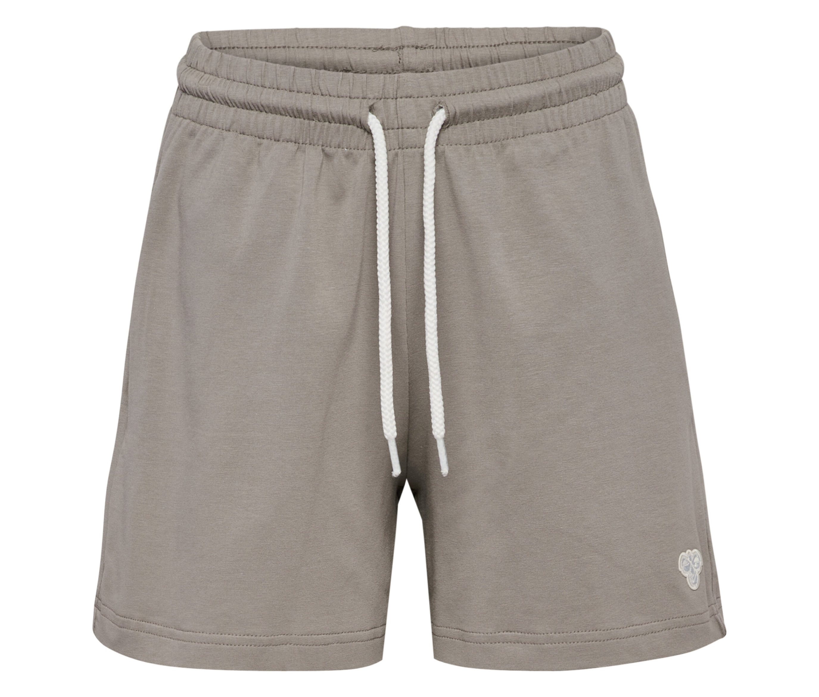 Gros plan sur un short ample hummel® HMLJR gris avec cordon blanc.
