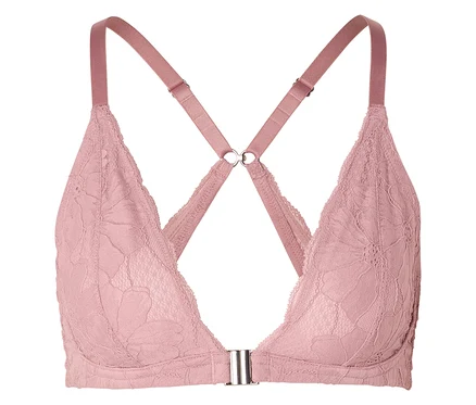 Gros plan d'un soutien-gorge rose en dentelle avec des bretelles croisées.