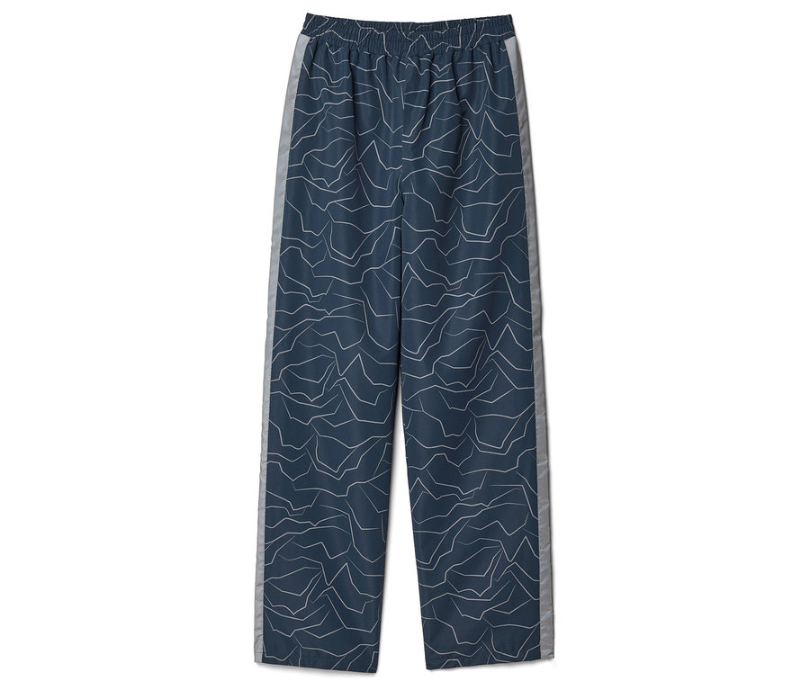 Un pantalon bleu avec motif blanc et bande latérale grise à plat.