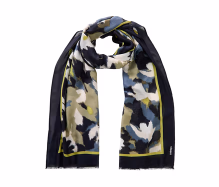 Écharpe avec un motif abstrait multicolore dans des tons de bleu marine, bleu clair, vert olive, blanc et jaune. Elle présente une bordure foncée avec une fine bande intérieure jaune vif et des extrémités effilochées. Le nom de la marque « olsen » est imprimé sur la bordure.