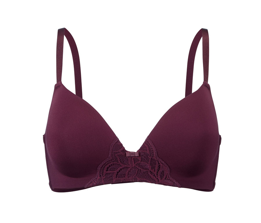 Un soutien-gorge à coques souples violet sur fond blanc.