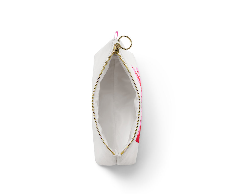 Trousse à cosmétiques ouverte avec motifs roses.