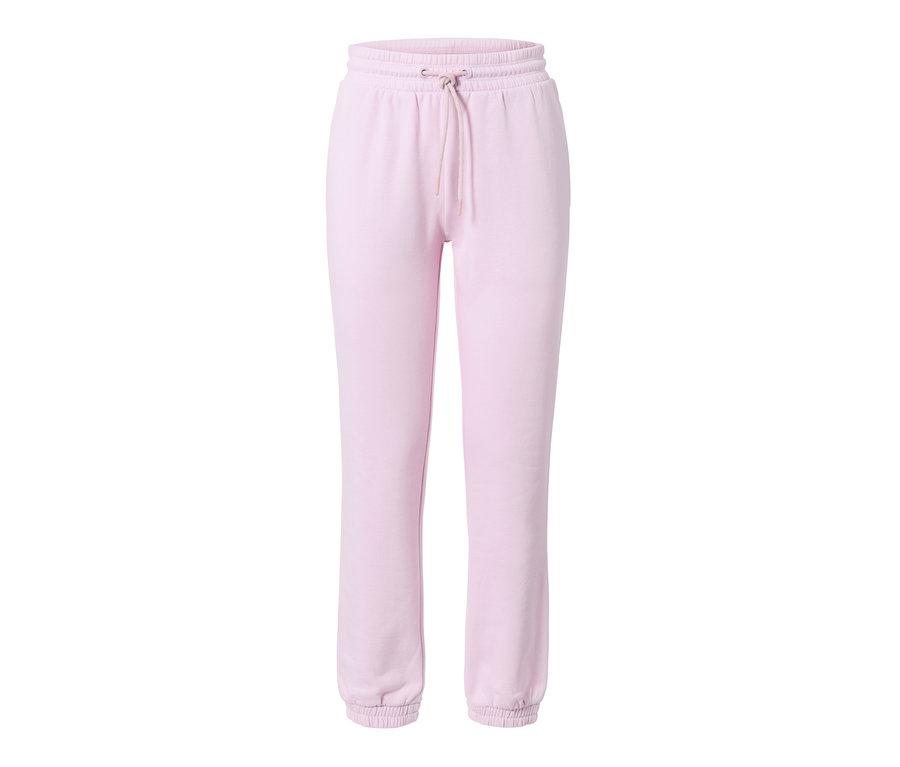 Pantalon de jogging rose clair avec taille élastique et cordon de serrage.