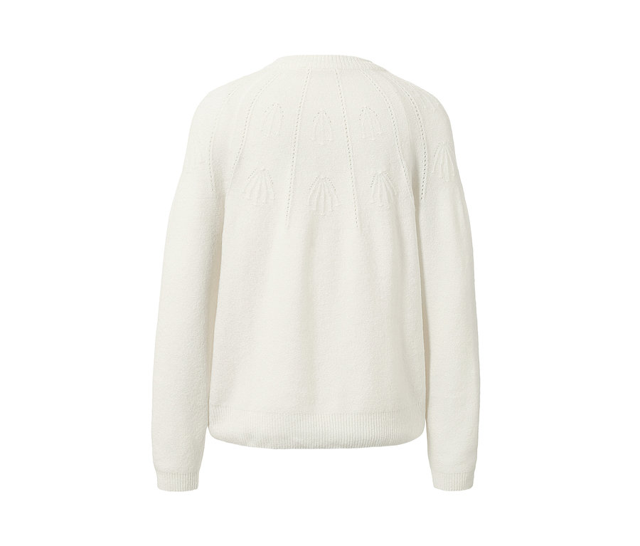 Gros plan sur l'arrière d'un pull en maille avec de la laine.