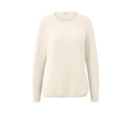 Pull en maille blanc crème.