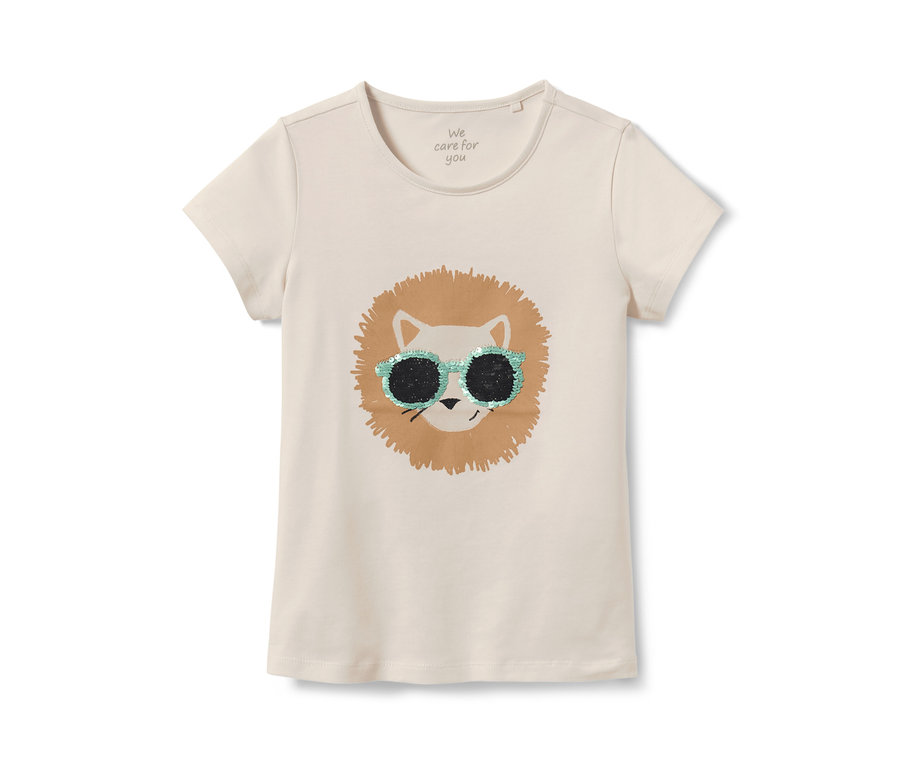 Un t-shirt pour enfant avec motif en paillettes réversibles représentant un lion portant des lunettes.
