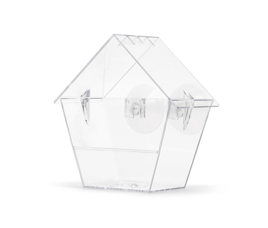 Une mangeoire à oiseaux transparente.