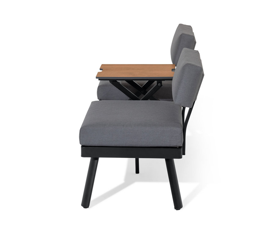 Vue latérale d'un canapé-lit 2 en 1 gris avec table centrale relevable.