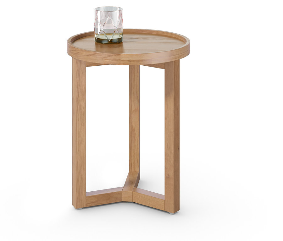 Verre sur une table d'appoint ronde.