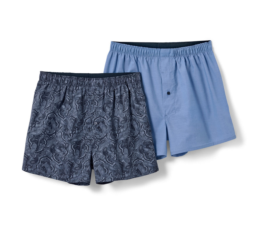 Deux boxers tissés, un bleu à motif cachemire, un bleu clair.
