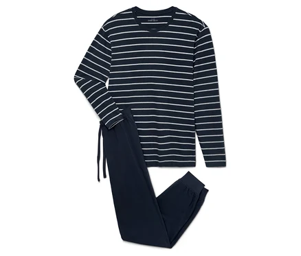 Pyjama bleu marine plié avec des rayures blanches, comprenant un haut à manches longues et un pantalon.