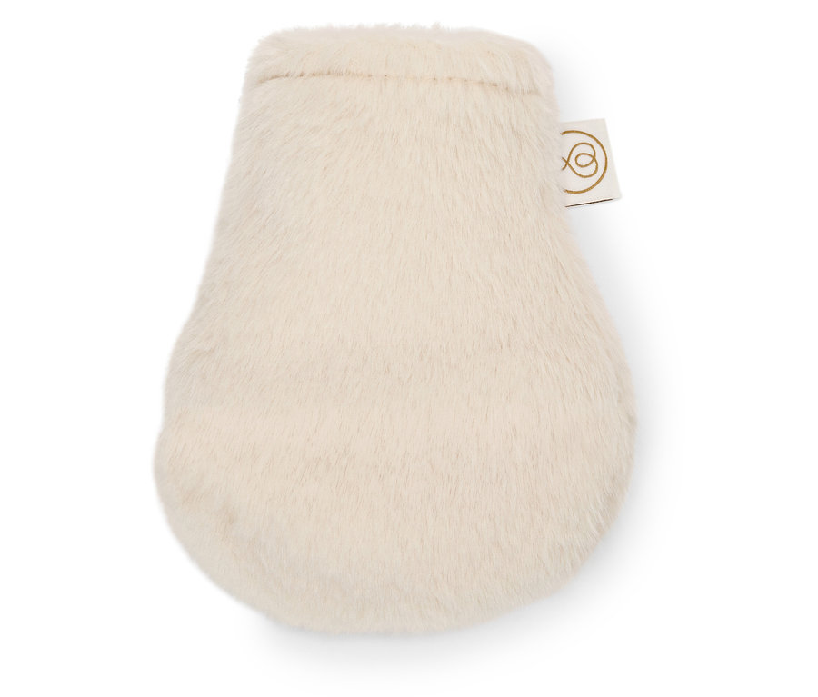 Une mini-bouillotte sur fond blanc.