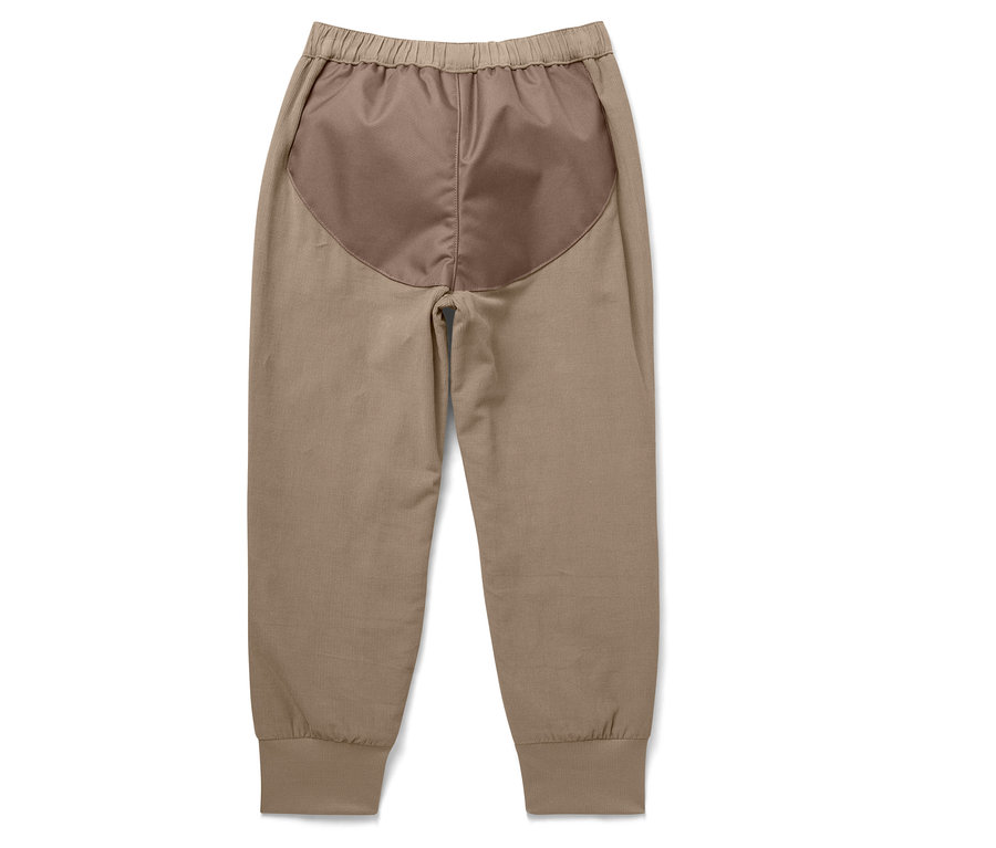 Pantalon de jogging beige avec empiècement marron au dos.