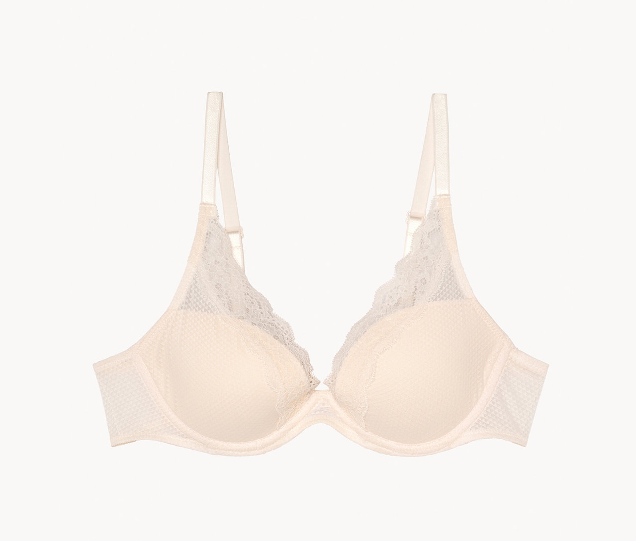Soutien-gorge couleur crème avec bordure en dentelle et bretelles.
