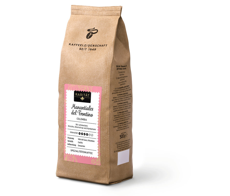 Un paquet de café Manantiales del Frontino Colombia sur fond blanc.