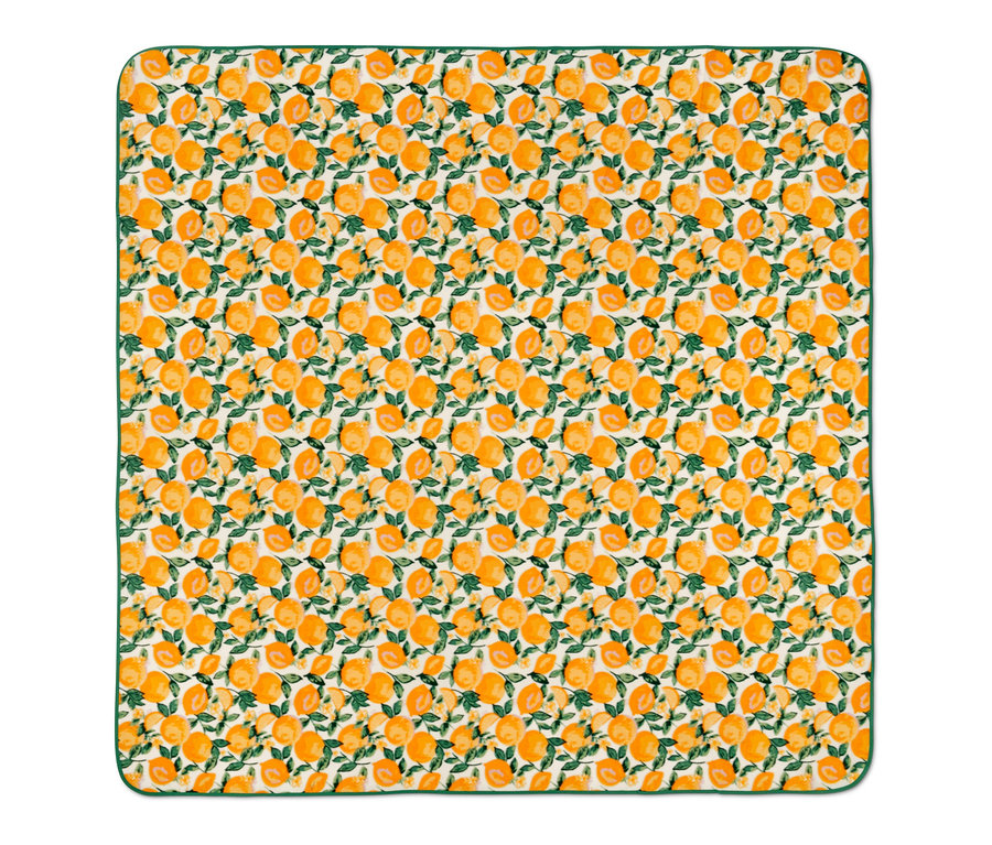 Une nappe de pique-nique XL avec un motif de citrons et une bordure verte.