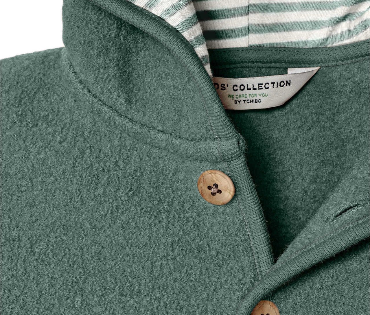 Gros plan sur une veste pour enfant en laine mérinos.