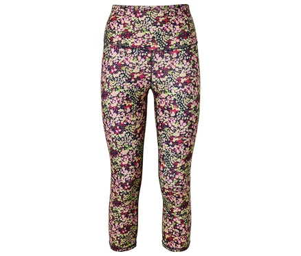 Gros plan d'un legging à motif floral sur fond blanc.