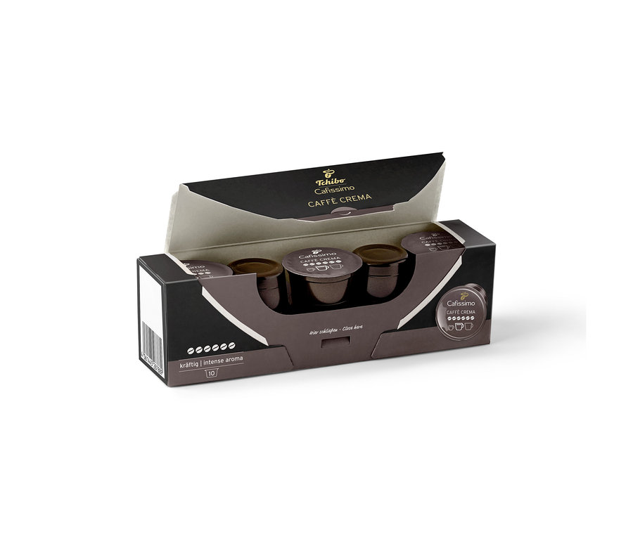 Boîte ouverte de Tchibo Cafissimo Caffè Crema Kräftig (corsé) – 10 capsules, montrant trois capsules marron foncé.