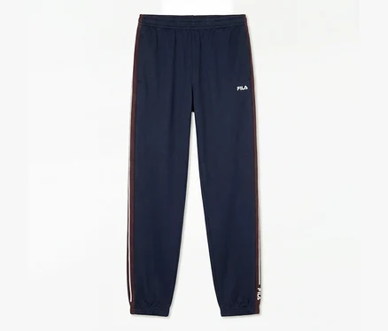 Pantalon de sport FILA pour homme bleu foncé avec chevilles élastiques et une bande rouge et blanche sur les côtés.