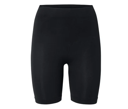 Un legging court noir sur fond blanc.