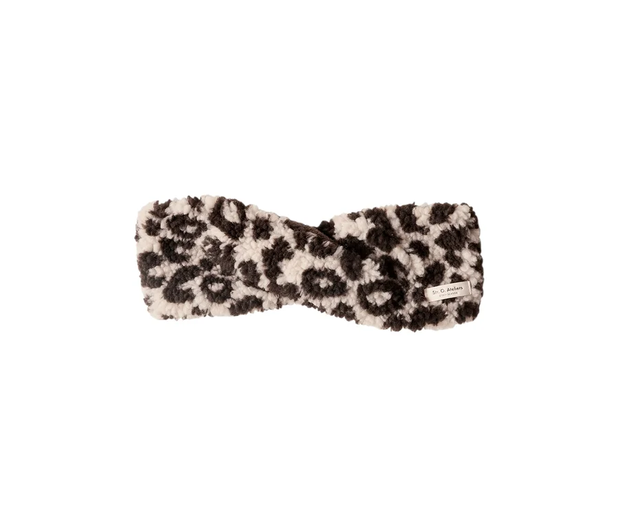 Bandeau Street One torsadé avec un motif léopard moelleux marron foncé et crème.