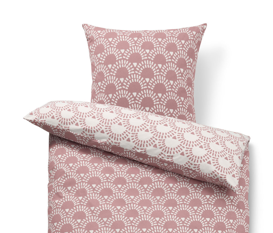 Parure de lit en jersey rose de taille standard et grande taille avec motif géométrique.