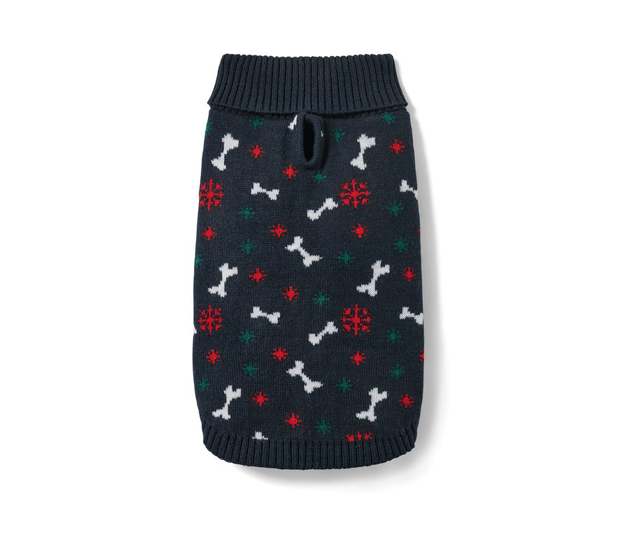 Pull pour chien bleu marine à motifs d'os, de flocons de neige et d'étoiles.