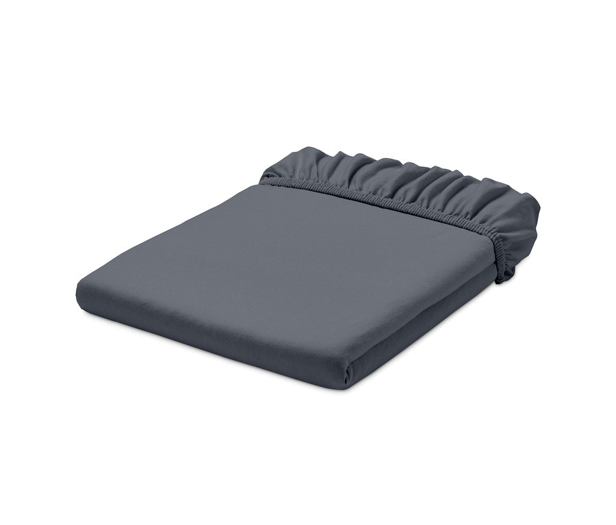 Draps-housses en jersey gris foncé pliés.