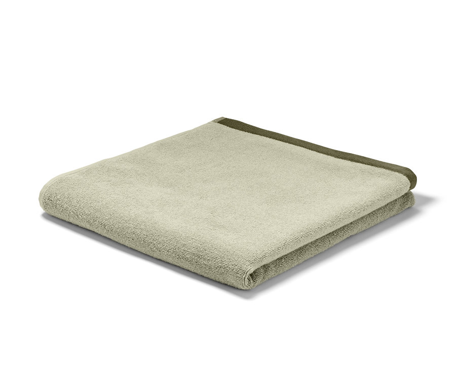 Serviette de bain en jacquard de haute qualité, vert sable-vert mousse, pliée.