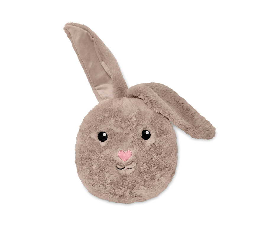 Un coussin en peluche petit lapin avec une oreille vers le haut et une oreille vers le bas.