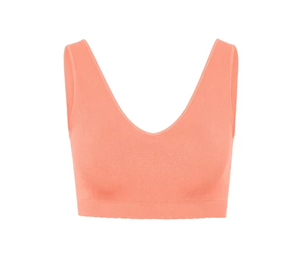 Gros plan d'un bustier sans couture couleur papaye.