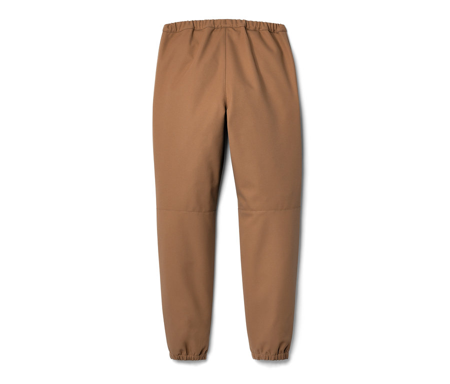 Pantalon en softshell marron pour enfant sur fond blanc.