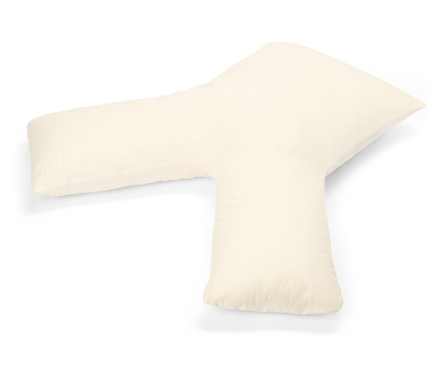 Un oreiller en forme de Y couleur crème sur fond blanc.