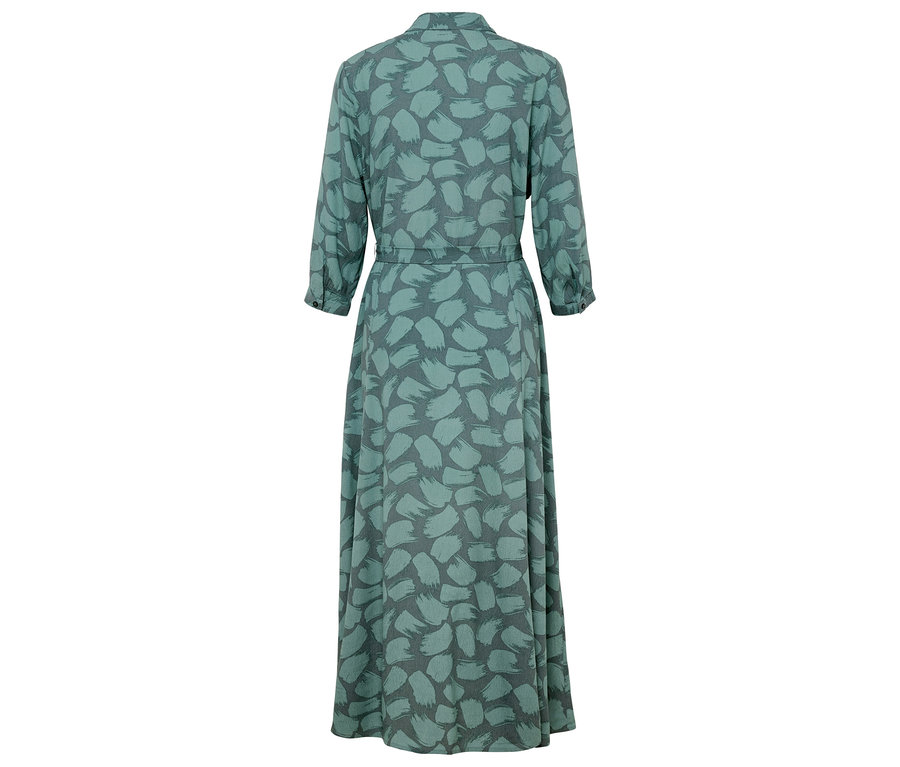 Vue arrière d'une longue robe verte à motifs.