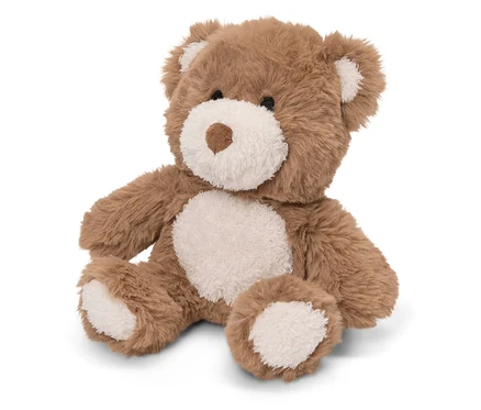 Un ours en peluche brun est assis sur un fond blanc.