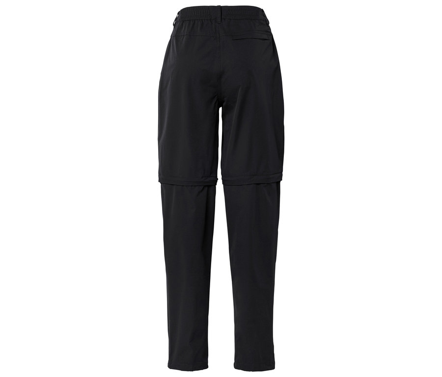 Pantalon noir avec jambes zippées.