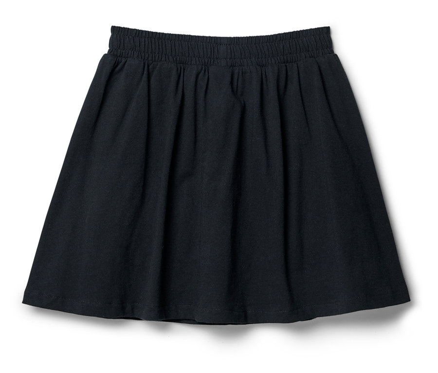 Une jupe bleu marine avec une taille élastique repose sur un fond blanc.