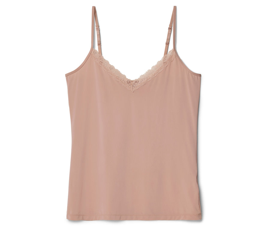 Un débardeur rose en dentelle à fines bretelles posé sur un fond blanc.