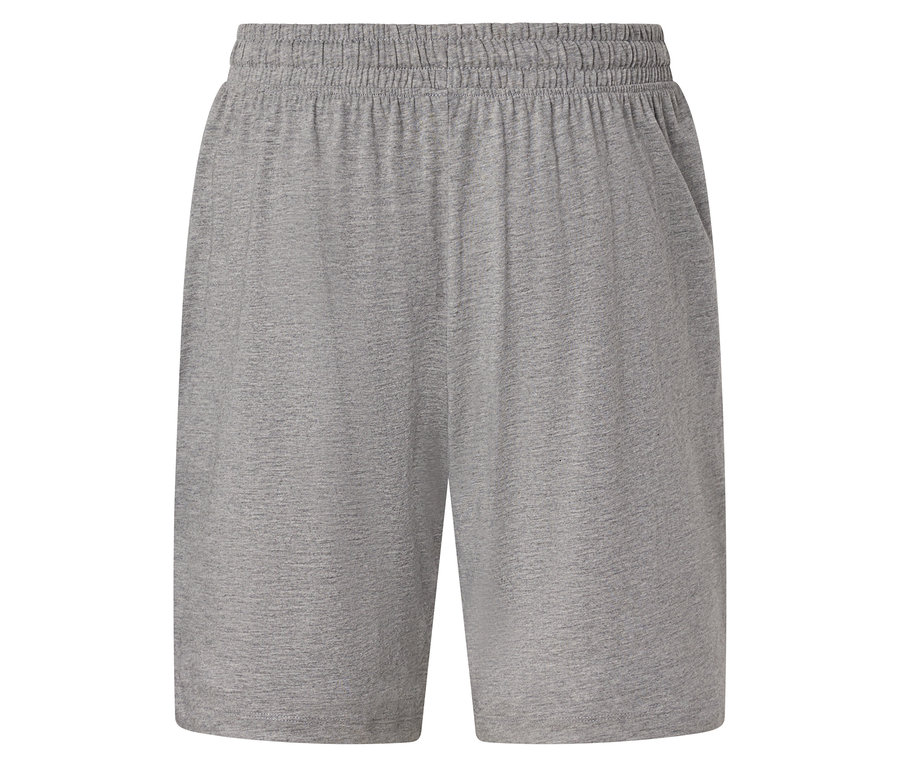 Gros plan sur un short gris avec une ceinture élastique.