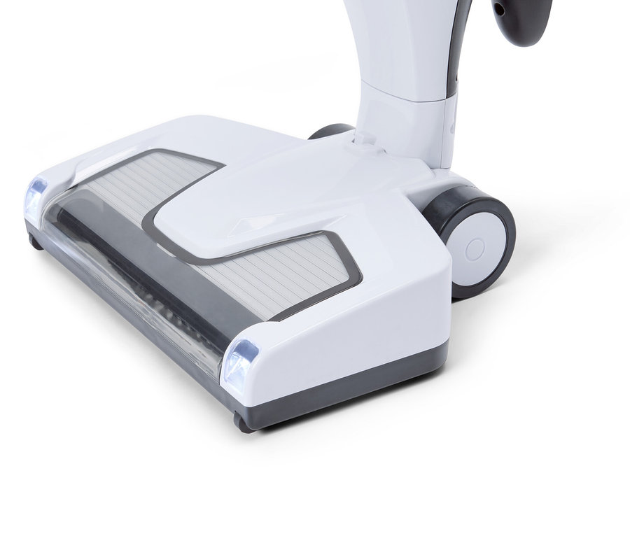 Gros plan de la tête d'aspirateur blanche avec des accents gris sur un fond blanc.