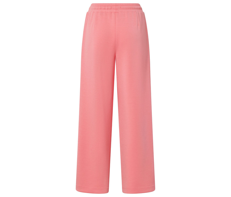 Pantalon corail à jambes larges.